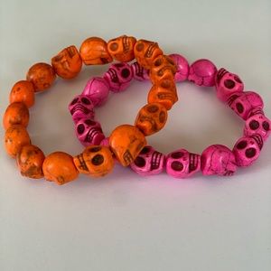 Pink and orange skull trendy skull bracelets.